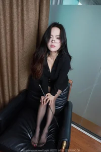 Elegant Fashion Photography Featuring TuTu in IESS Charming Black Clothes Collection - image 0