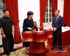 PM Le Minh Hung Hosts State Banquet for Japan's Takaichi Sanae - image 1
