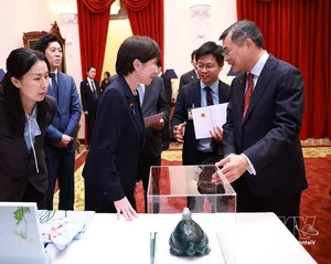PM Le Minh Hung Hosts State Banquet for Japan's Takaichi Sanae - image 2