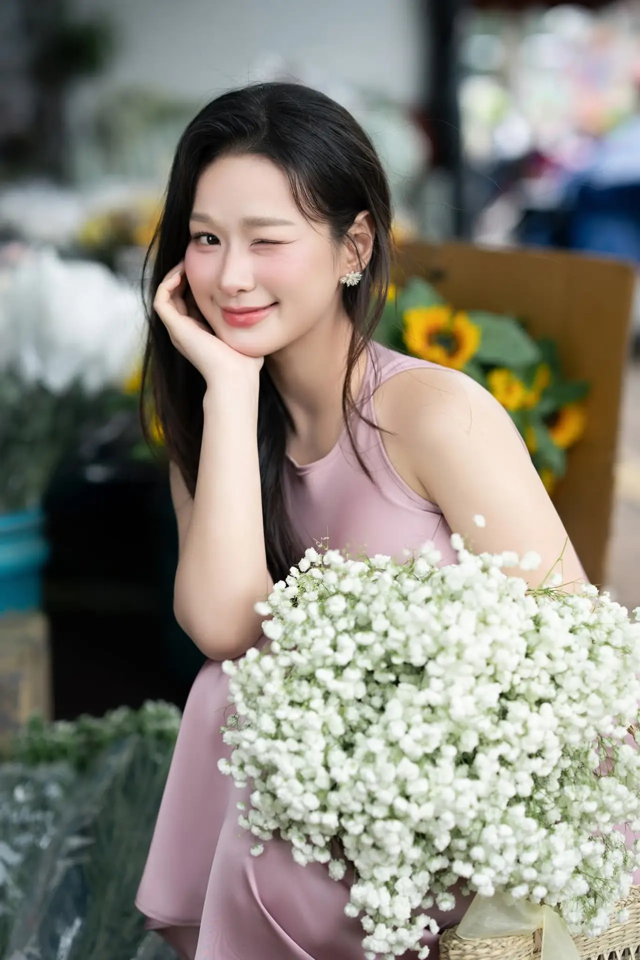 Pure Beauty of a Muse with Pink Lilies: A Peaceful Moment in Nature