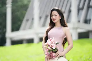 Pure Beauty of a Muse with Pink Lilies: A Peaceful Moment in Nature - image 5