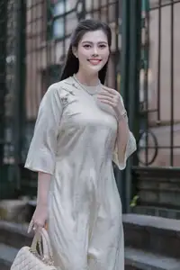 VGU No.162: Modern Ao Dai Grace: Vietnamese Woman's Elegant Style & Allure on City Streets. - image 0