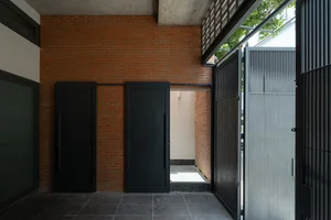 Innovative Tube House Architecture in Ho Chi Minh City Featuring Unique Ventilation Bricks - image 0