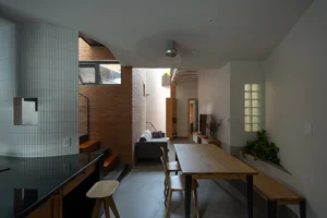 Innovative Tube House Architecture in Ho Chi Minh City Featuring Unique Ventilation Bricks - image 3