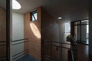 Innovative Tube House Architecture in Ho Chi Minh City Featuring Unique Ventilation Bricks - image 5