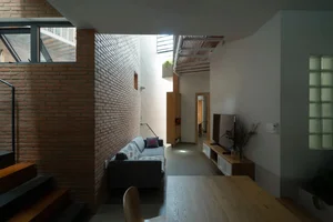 Innovative Tube House Architecture in Ho Chi Minh City Featuring Unique Ventilation Bricks - image 2