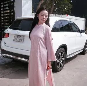 Phan Van Duc's Wife Stuns in Elegant Traditional Ao Dai Amidst Ancient Charm - image 6