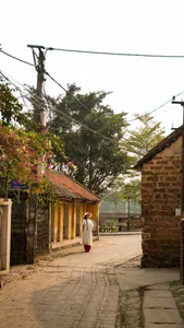 Timeless Grace: Capturing the Beauty of Ao Dai in Duong Lam Ancient Village - image 3