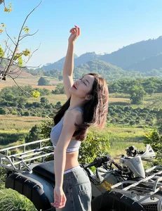 Mountain Chic: Hot Girl Blends Bold Fashion with Breathtaking Wilderness Scenery - image 5