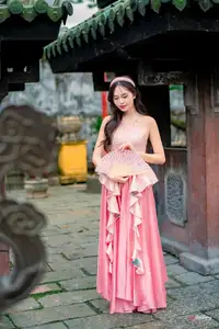 Graceful Woman in Pink Dress Amidst Ancient Heritage Charm 1000025280 - image 8