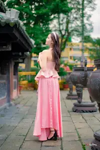 Graceful Woman in Pink Dress Amidst Ancient Heritage Charm 1000025280 - image 5