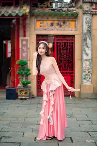 Graceful Woman in Pink Dress Amidst Ancient Heritage Charm 1000025280 - image 3