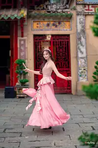 Graceful Woman in Pink Dress Amidst Ancient Heritage Charm 1000025280 - image 4
