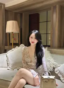 Captivating Beauty: Young Woman in Elegant Lace Dress Shines in Luxurious Restaurant Setting. - image 2