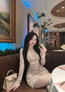 Captivating Beauty: Young Woman in Elegant Lace Dress Shines in Luxurious Restaurant Setting. - image 4