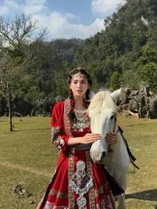 Miss Vietnam Tran Tieu Vy shines in traditional ethnic attire amidst the majestic mountains - image 7