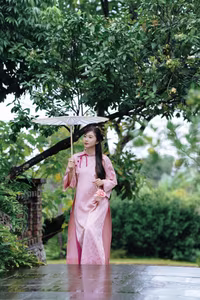 VGU No.160: Discover the Gentle Beauty of a Pink Ao Dai Maiden in a Dreamy Garden - image 0