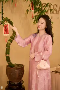 Asian Grace: Vietnamese Woman's Radiant Smile & Elegant Tea Moment - image 3