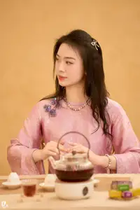 Asian Grace: Vietnamese Woman's Radiant Smile & Elegant Tea Moment - image 8