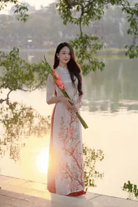 Timeless Elegance of Vietnamese Ao Dai by the Lake - image 7