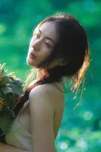Serene Braided Beauty Bathed in Golden Sunlight - image 2