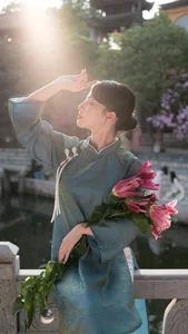 Classic Elegance: Vietnamese Tradition in Blue Silk and Pink Lilies - image 10