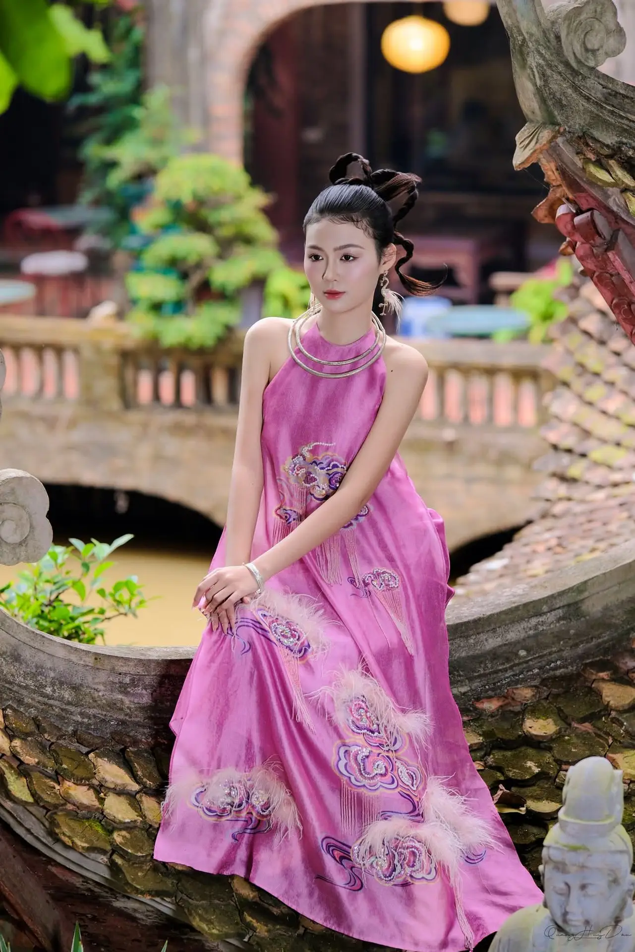 Timeless Grace: Vietnamese Woman's Modern Elegance Amidst Ancient Architecture.