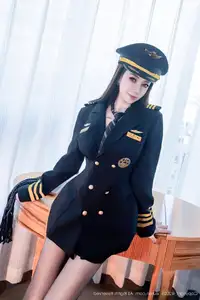 Discover the Captivating Charm of Song Guo Er (XiuRen No.10580) in Her Seductive Pilot Attire - image 3
