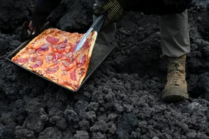 Gourmet Pizza Baked on Real Volcanic Lava Heat - image 1