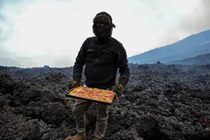 Gourmet Pizza Baked on Real Volcanic Lava Heat - image 2