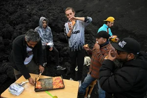 Gourmet Pizza Baked on Real Volcanic Lava Heat - image 8