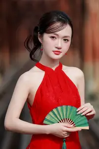 Asian Beauty: Graceful Woman in Traditional Red Dress, Radiant Charm - image 3