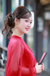 Asian Beauty: Graceful Woman in Traditional Red Dress, Radiant Charm - image 5