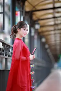 Asian Beauty: Graceful Woman in Traditional Red Dress, Radiant Charm - image 4