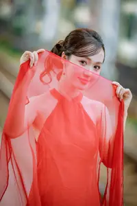 Asian Beauty: Graceful Woman in Traditional Red Dress, Radiant Charm - image 7