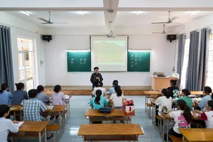 Honoring Tradition: The Vietnamese Teacher Preserving Heritage Through the Iconic Ao Dai and Wooden Clogs - image 2