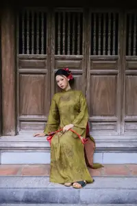 Graceful Vietnamese Ao Dai: Traditional Beauty Adorned with Red Calla Lilies - image 7