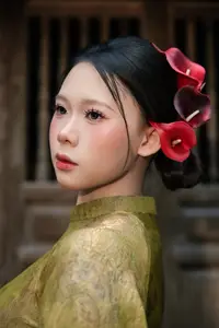 Graceful Vietnamese Ao Dai: Traditional Beauty Adorned with Red Calla Lilies - image 12