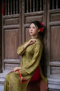 Graceful Vietnamese Ao Dai: Traditional Beauty Adorned with Red Calla Lilies - image 10