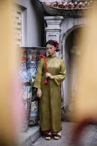 Graceful Vietnamese Ao Dai: Traditional Beauty Adorned with Red Calla Lilies - image 3