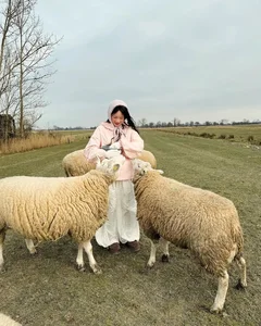 Viral Study Abroad Influencer Captivates Fans with Stunning Pastoral Shepherdess Photoshoot - image 8
