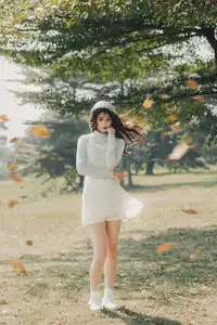 Ethereal Beauty: Young Woman in White Lace Dress Amidst Daisy Field Under Summer Sun - image 11