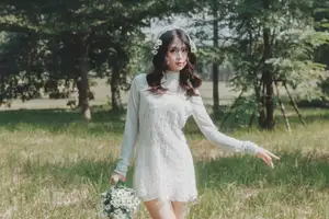 Ethereal Beauty: Young Woman in White Lace Dress Amidst Daisy Field Under Summer Sun - image 12
