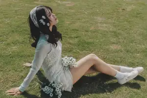 Ethereal Beauty: Young Woman in White Lace Dress Amidst Daisy Field Under Summer Sun - image 8