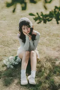 Ethereal Beauty: Young Woman in White Lace Dress Amidst Daisy Field Under Summer Sun - image 10