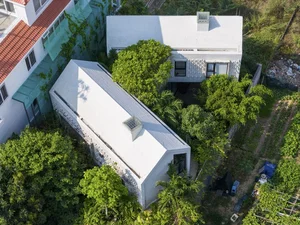 Stunning Twin Houses Architecture Nestled Within the Lush Forests of Da Nang - image 3