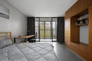 Modern Concrete Architecture: Exploring a Unique Sun-Drenched Home in Hanoi - image 1