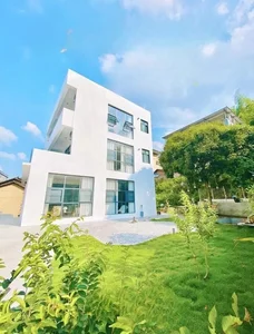 Modern Garden House Design: A Young Couple's 370m2 Dream Home Built for Peace and Serenity - image 3