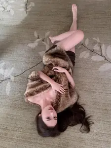 Captivating Allure: Mysterious Beauty in Luxurious Fur, A Sensual Portrait - image 3