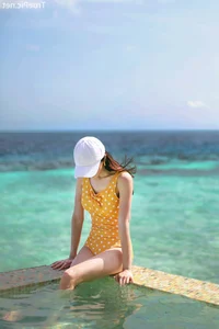 Jeong Hee Redefines Summer Elegance in Latest Monokini Shoot - image 29